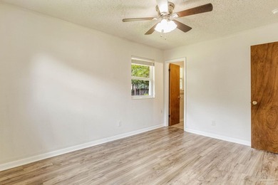 Step into the delightful 3-bedroom, 2-bath haven nestled in the - photo 13