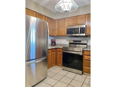 Fabulous view from this 3rd floor corner unit, elevator takes - photo 14