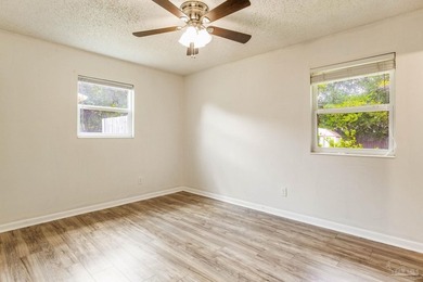 Step into the delightful 3-bedroom, 2-bath haven nestled in the - photo 14