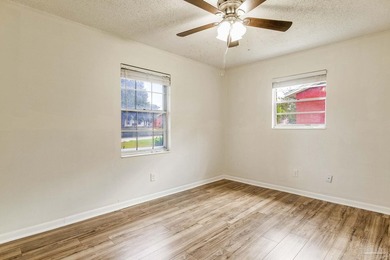 Step into the delightful 3-bedroom, 2-bath haven nestled in the - photo 15