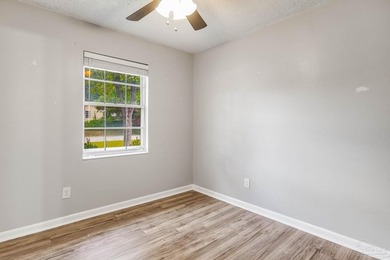 Step into the delightful 3-bedroom, 2-bath haven nestled in the - photo 18