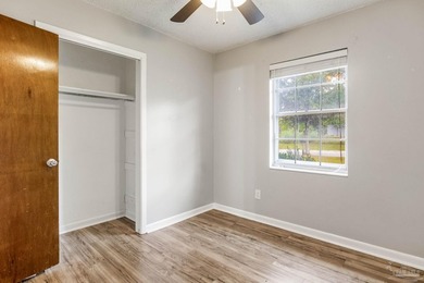Step into the delightful 3-bedroom, 2-bath haven nestled in the - photo 19