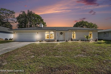 This exceptional 3-bed, 2-bath home in NW Palm Bay offers an - photo 1