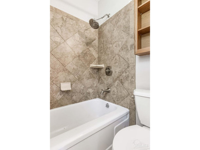Step into the delightful 3-bedroom, 2-bath haven nestled in the - photo 24