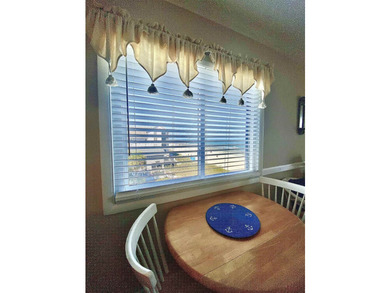 Fabulous view from this 3rd floor corner unit, elevator takes - photo 26