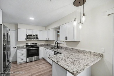 This exceptional 3-bed, 2-bath home in NW Palm Bay offers an - photo 6