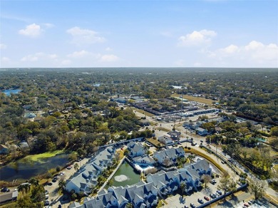 Welcome to this ground-floor, corner-unit condo that offers an - photo 34