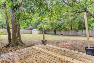 Step into the delightful 3-bedroom, 2-bath haven nestled in the - photo 35