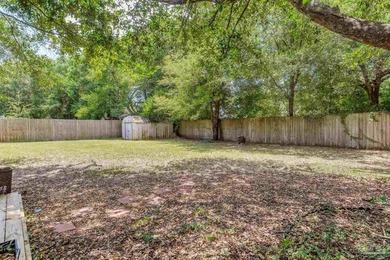 Step into the delightful 3-bedroom, 2-bath haven nestled in the - photo 39