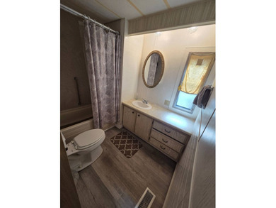 Welcome to this well-maintained 2 bedroom, 2 bathroom mobile - photo 13