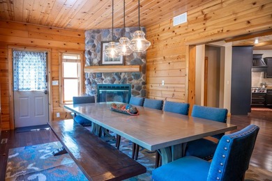 Sweeping lake views in this custom log retreat designed for - photo 20