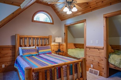 Sweeping lake views in this custom log retreat designed for - photo 27