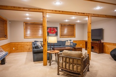 Sweeping lake views in this custom log retreat designed for - photo 29