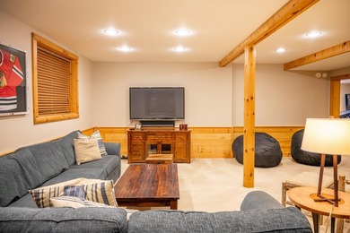 Sweeping lake views in this custom log retreat designed for - photo 31