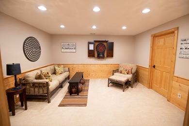 Sweeping lake views in this custom log retreat designed for - photo 32
