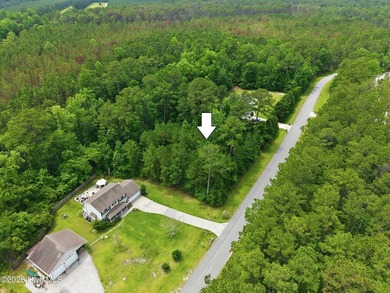 Tucked away from the hustle and bustle, this wooded homesite in - photo 3