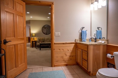 Sweeping lake views in this custom log retreat designed for - photo 37