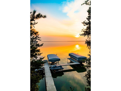 Sweeping lake views in this custom log retreat designed for - photo 42