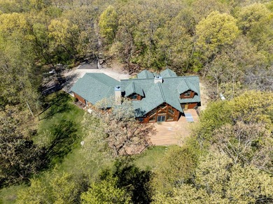 Sweeping lake views in this custom log retreat designed for - photo 46