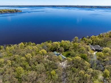 Sweeping lake views in this custom log retreat designed for - photo 47