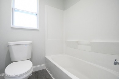 This updated Palm Bay home is set just off a main road, making - photo 10
