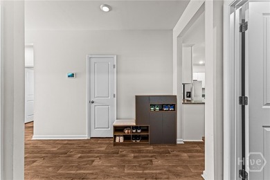 Welcome to this beautiful 4-bedroom, 2-bath home featuring an - photo 17