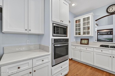 Situated on an oversized corner lot framed by mature oaks, this - photo 24