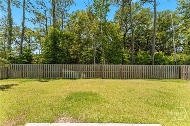 Welcome to this beautiful 4-bedroom, 2-bath home featuring an - photo 33