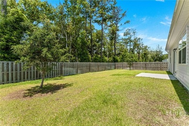 Welcome to this beautiful 4-bedroom, 2-bath home featuring an - photo 34