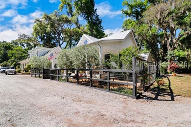 A storybook cottage in the heart of downtown Bluffton, this - photo 47