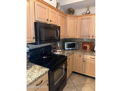 Impeccably maintained 3BR/2BA third-floor waterfront condo in