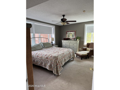 Impeccably maintained 3BR/2BA third-floor waterfront condo in