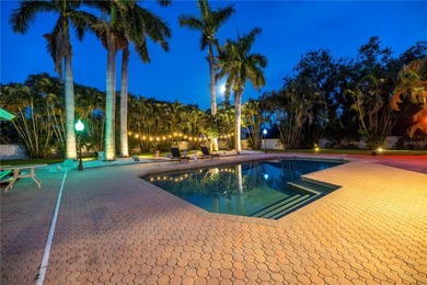 Welcome to 4930 Sandpiper Lane, a stunning estate nestled within - photo 3