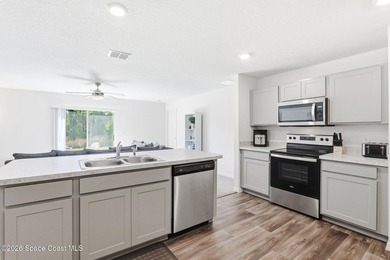Welcome home to this beautifully designed 4 bedroom, 2 bathroom - photo 7