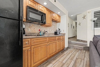 Welcome to this stunning one-bedroom, one-bathroom oceanfront - photo 13
