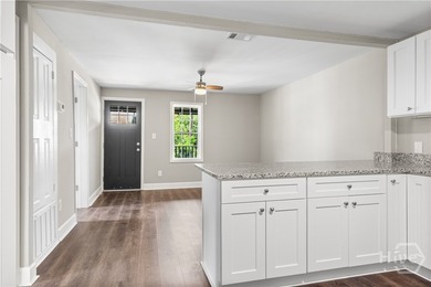 Discover this beautifully renovated home, fully refreshed from - photo 13