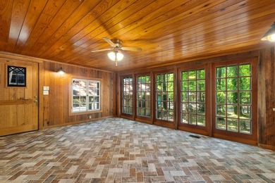 Hidden beneath towering hardwoods on a private wooded setting - photo 14