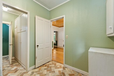 Hidden beneath towering hardwoods on a private wooded setting - photo 16