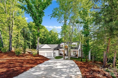 Tucked within the prestigious Verdict Ridge Golf and Country - photo 2