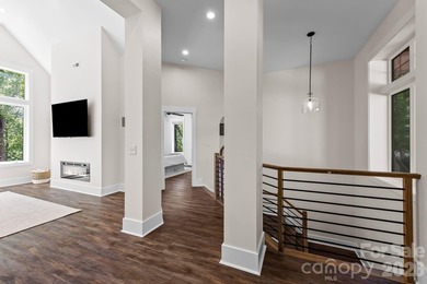 Tucked within the prestigious Verdict Ridge Golf and Country - photo 6