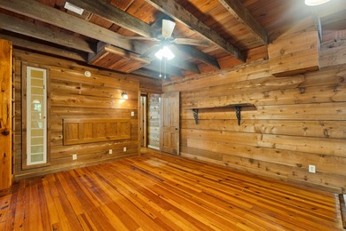 Hidden beneath towering hardwoods on a private wooded setting - photo 30