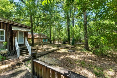 Hidden beneath towering hardwoods on a private wooded setting - photo 36