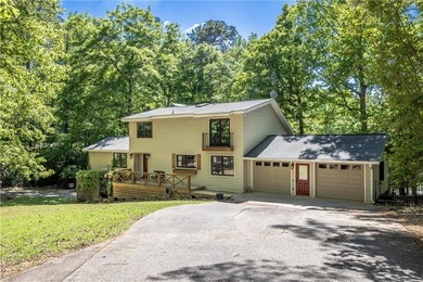 Experience refined lake living in this exceptional 5-bedroom, 3 - photo 2