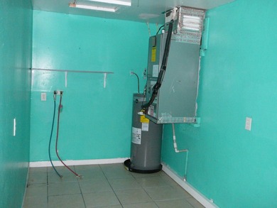 HUGE CBS DUPLEX ZONED GENERAL COMMERCIAL WHICH IS A LEGAL NON - photo 42