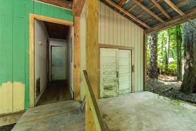 Hidden beneath towering hardwoods on a private wooded setting - photo 47
