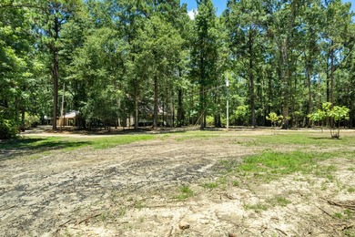 Hidden beneath towering hardwoods on a private wooded setting - photo 50