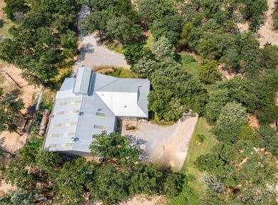 Enjoy quiet country living in this unique barndominium style - photo 5