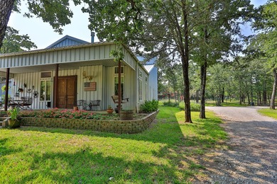 Enjoy quiet country living in this unique barndominium style - photo 7