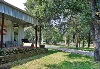Enjoy quiet country living in this unique barndominium style - photo 8