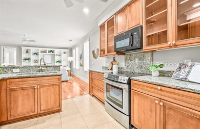 Welcome home to this luxurious lock-and-leave condominium in - photo 16